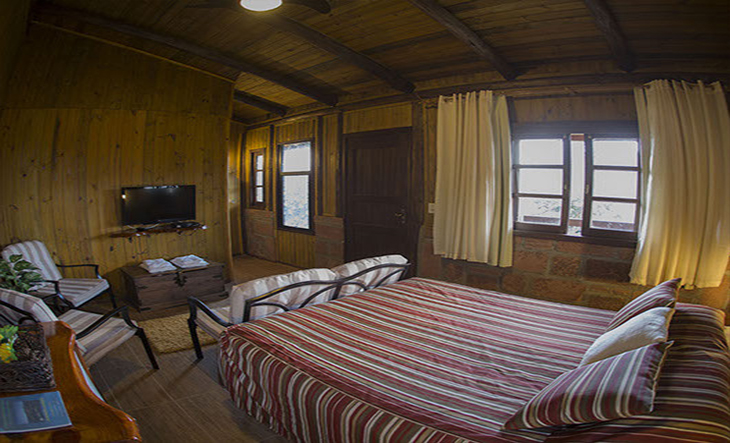 Cama confortável em hotel na serra gaúcha